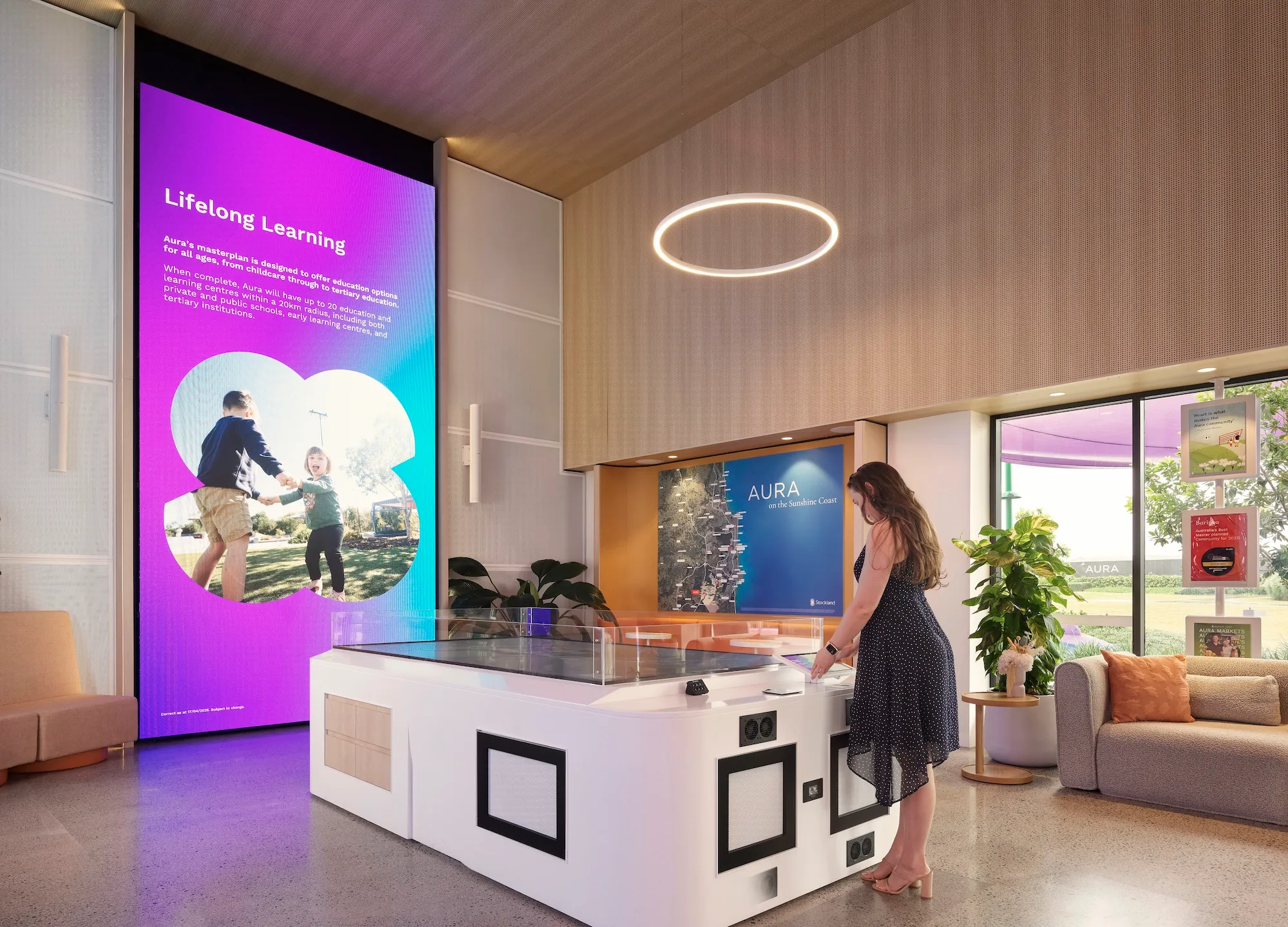 Modern property display suite with large-format touch screens